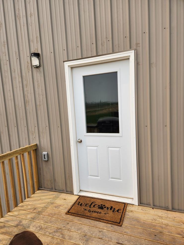 Restful Refuge cabin entrance by Devils Lake, North Dakota